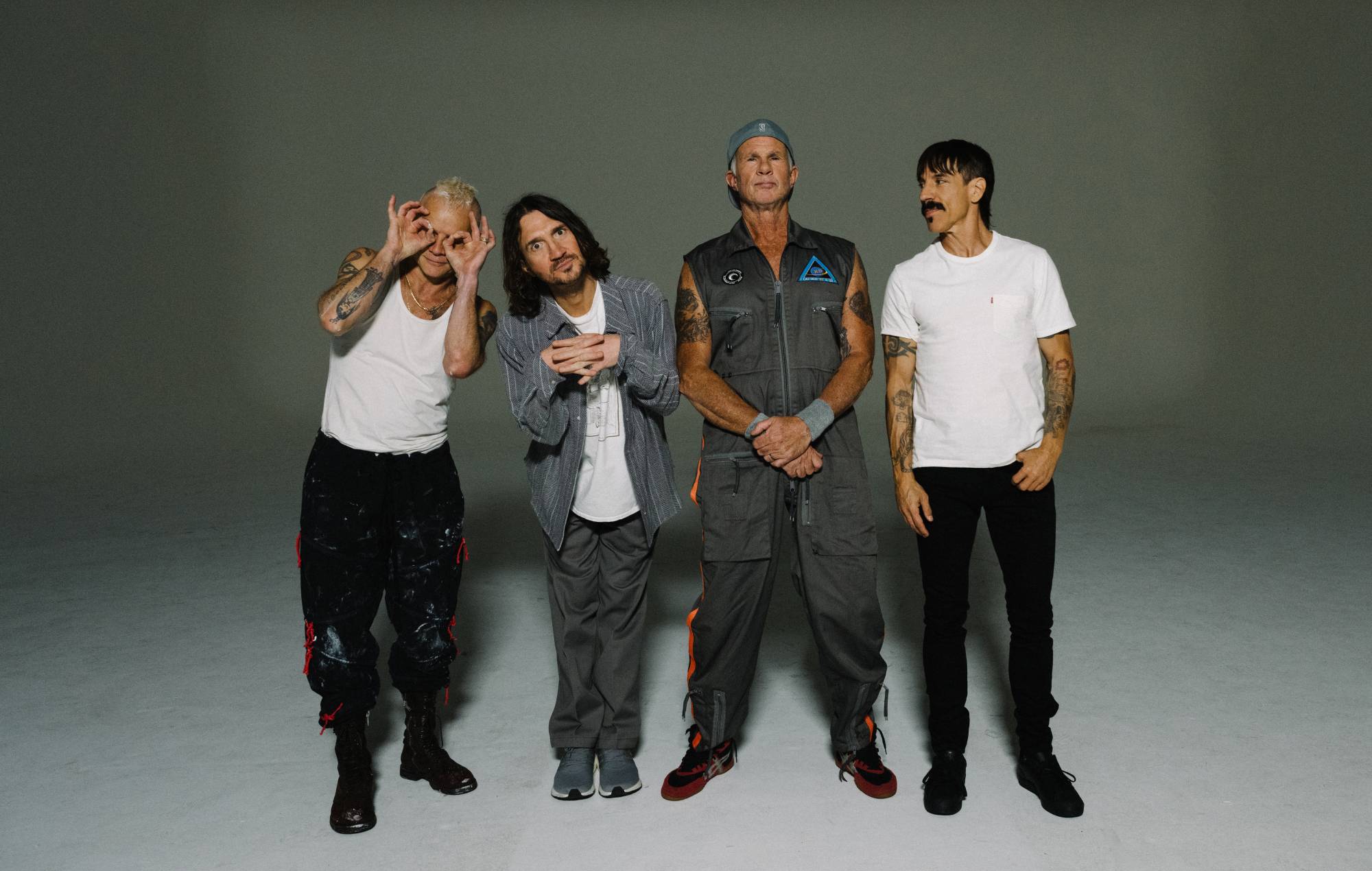 Group image of the Red Hot Chili Peppers in 2022. From left to right: Bassist Flea, Guitarist John Frusciante, Drummer Chad Smith, Lead Vocalist Anthony Kiedis.
